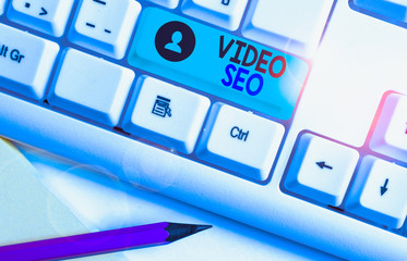 Writing note showing Video Seo. Business concept for the process of improving the ranking or...