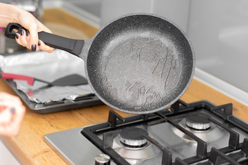 Pouring vegetable oil into frying pan