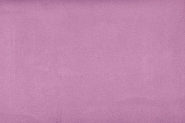 Cardboard pink abstract pattern texture close-up. Retro old paper background. Grunge concrete wall. Vintage blank wallpaper.