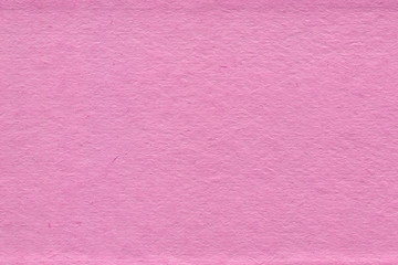 Cardboard pink abstract pattern texture close-up. Retro old paper background. Grunge concrete wall. Vintage blank wallpaper.