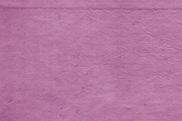Cardboard pink abstract pattern texture close-up. Retro old paper background. Grunge concrete wall. Vintage blank wallpaper.