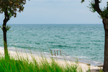 metal stairs in the sea on the boulevard, along the Adriatic Sea in Opatija, Croatia