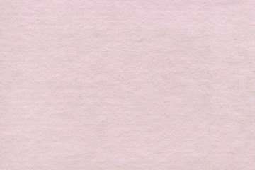 Cardboard pink abstract pattern texture close-up. Retro old paper background. Grunge concrete wall. Vintage blank wallpaper.