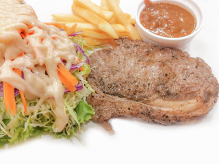 Steak and vegetable salad on the plate