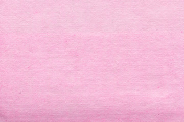 Cardboard pink abstract pattern texture close-up. Retro old paper background. Grunge concrete wall. Vintage blank wallpaper.