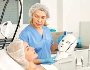 Plastic surgeon preparing for operation