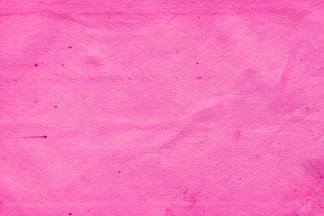 Fototapeta premium Cardboard pink abstract pattern texture close-up. Retro old paper background. Grunge concrete wall. Vintage blank wallpaper.