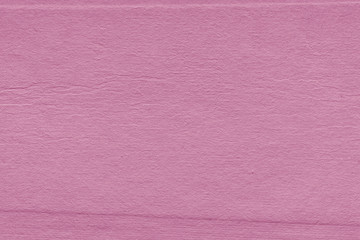 Cardboard pink abstract pattern texture close-up. Retro old paper background. Grunge concrete wall. Vintage blank wallpaper.