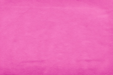 Fototapeta premium Cardboard pink abstract pattern texture close-up. Retro old paper background. Grunge concrete wall. Vintage blank wallpaper.