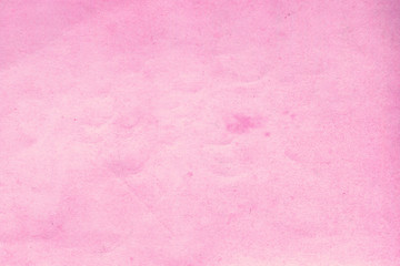 Cardboard pink abstract pattern texture close-up. Retro old paper background. Grunge concrete wall. Vintage blank wallpaper.