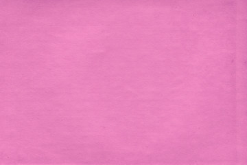 Cardboard pink abstract pattern texture close-up. Retro old paper background. Grunge concrete wall. Vintage blank wallpaper.