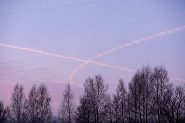 Fototapeta na wymiar X chemtrail sign in the sky