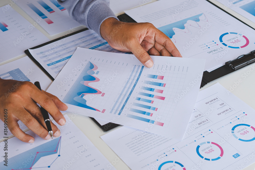 Poster businessman working calculate data document graph chart report marketing research development planni