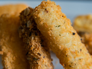 breaded fish on a white background