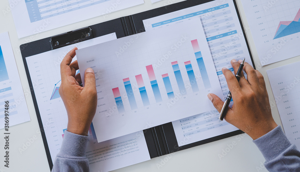 Poster businessman working calculate data document graph chart report marketing research development planni