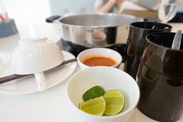 Sukiyaki pot and starter set with lime and garlic and dipping sauce