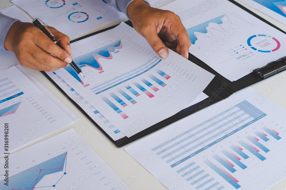 Poster businessman working calculate data document graph chart report marketing research development planni