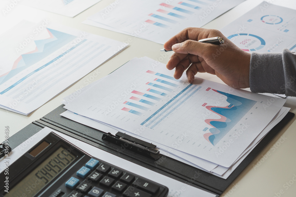 Poster businessman working calculate data document graph chart report marketing research development planni