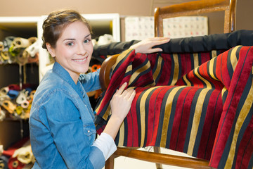 woman working in upholstery workshop