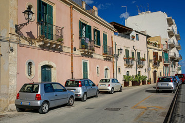 Fototapeta premium picturesque sea promenade in Ortigia, oldest part of the beautiful baroque city of Syracuse in Sicily, Italy