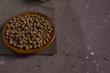 roasted chickpeas in brown bowl