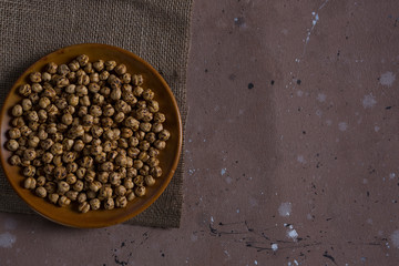 roasted chickpeas in brown bowl