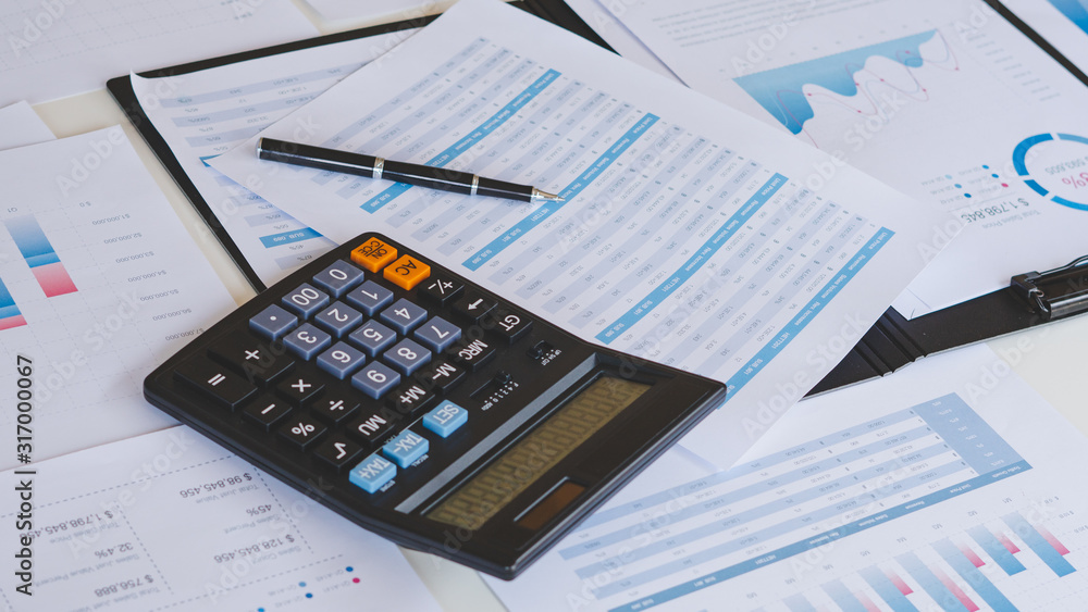 Aufkleber businessman working calculate data document graph chart report marketing research development planni