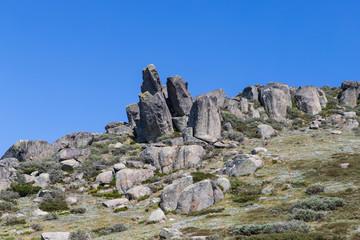 Fototapeta na wymiar Rock formation on the mountainous with clear blue sky.