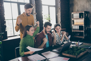 Portrait of four nice attractive cheerful cheery glad professional people IT recruiter meeting...