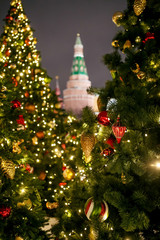Moscow, Russia. The Kremlin’s corner arsenal tower against the backdrop of the Christmas tree. - 317001250