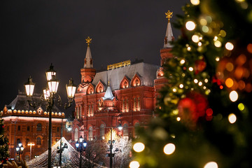 Moscow, Russia. Russian historical museum on the background of the Christmas tree. The inscription on the building: 