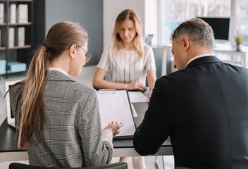Human resources commission interviewing woman in office