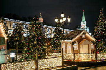 Moscow, Russia. Christmas decorations, houses on the background of the Moscow Kremlin - 317001421