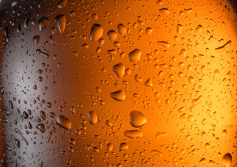 Misted glass of beer bottle. Close up shot.