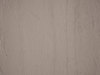 Brown abstract background. Beautiful brown textured stucco on the wall. Old gray stucco dirty with drips.