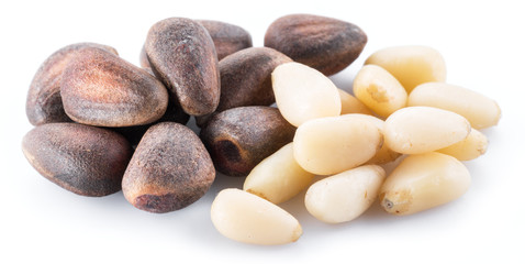 Pine nuts on the white background. Organic food.
