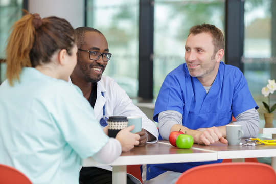 Colleagues In The Hospital Cafeteria