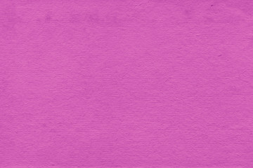 Fototapeta premium Cardboard pink abstract pattern texture close-up. Retro old paper background. Grunge concrete wall. Vintage blank wallpaper.