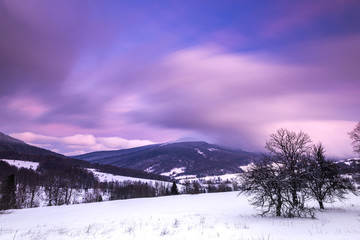 Pastel Pink Sunrise over Bieszczady Mountains in Poland. Long Exposure Photo. Panoramic View