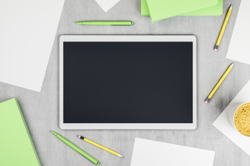 Top view of digital tablet with cup of coffee and work accessories on wooden table, mockup. 3D Rendering