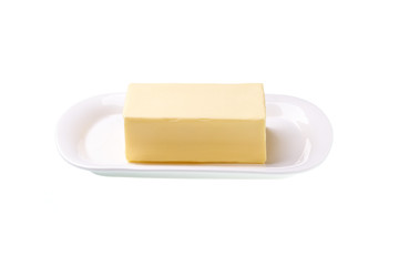 Butter in white ceramic butter dish, top view.