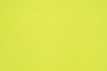 Lemon yellow textured felt fabric material background