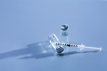 Ampoules, vials, syringe. Medical injection,diseases,health care,diabetes,insulin. Syringe with...