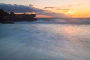 Long exposure morning view of torii gate in the sea at Shirahama shrine, Izu Peninsula, Japan