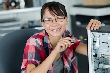 female woman working on pc workshop