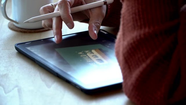 Drawing on a tablet with pencil