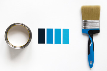 Paint color chart sample swatches, paint brush and tin of paint. Color trend 2020 classic blue. Concept choice color.