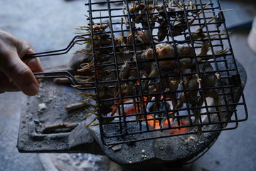 Small frog Grill on the stove, Rural food of Thai people.