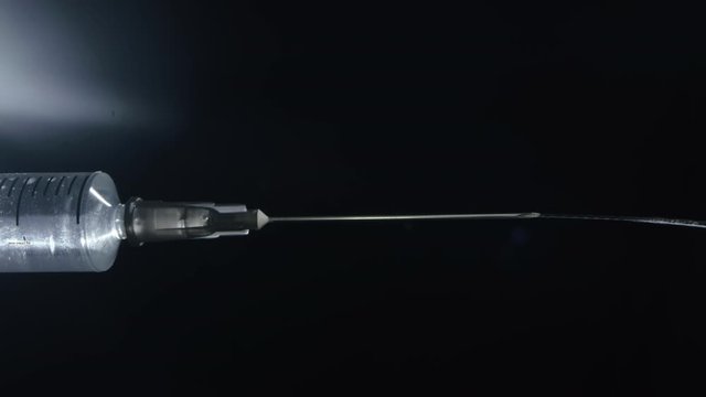 Close-up of medical syringe with drug