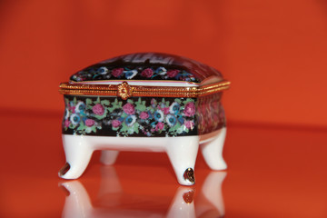 Ceramic box on an orange background